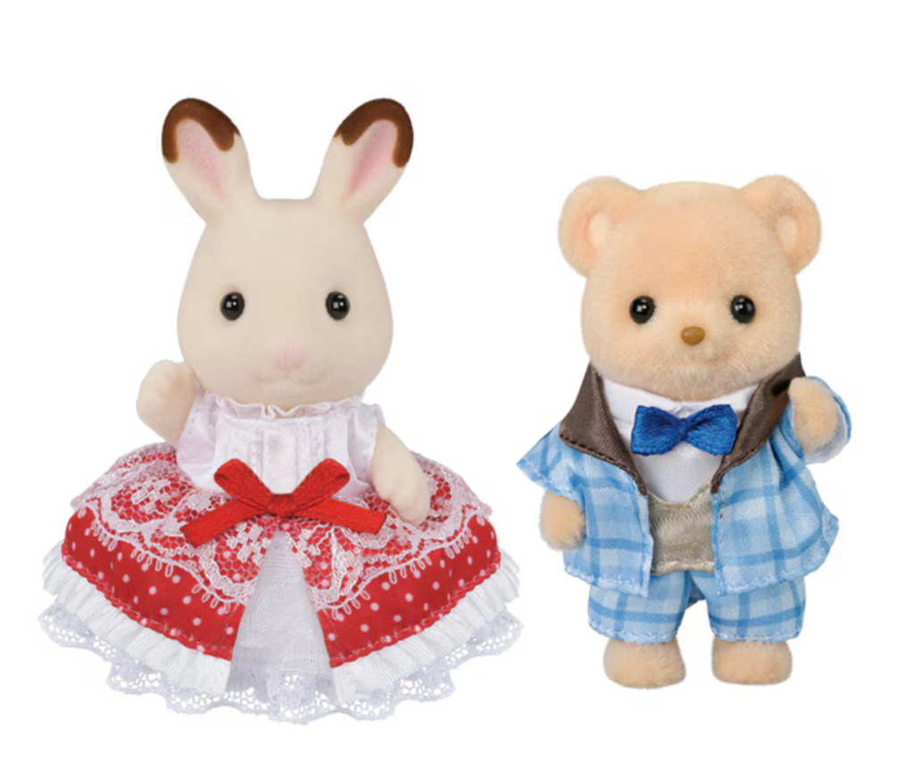 Freya Rabbit girl wearing a special re and white dress and Theo Bear dressed in a blue plaid suit to commemorate the 40th anniversary of Calico Critters. 