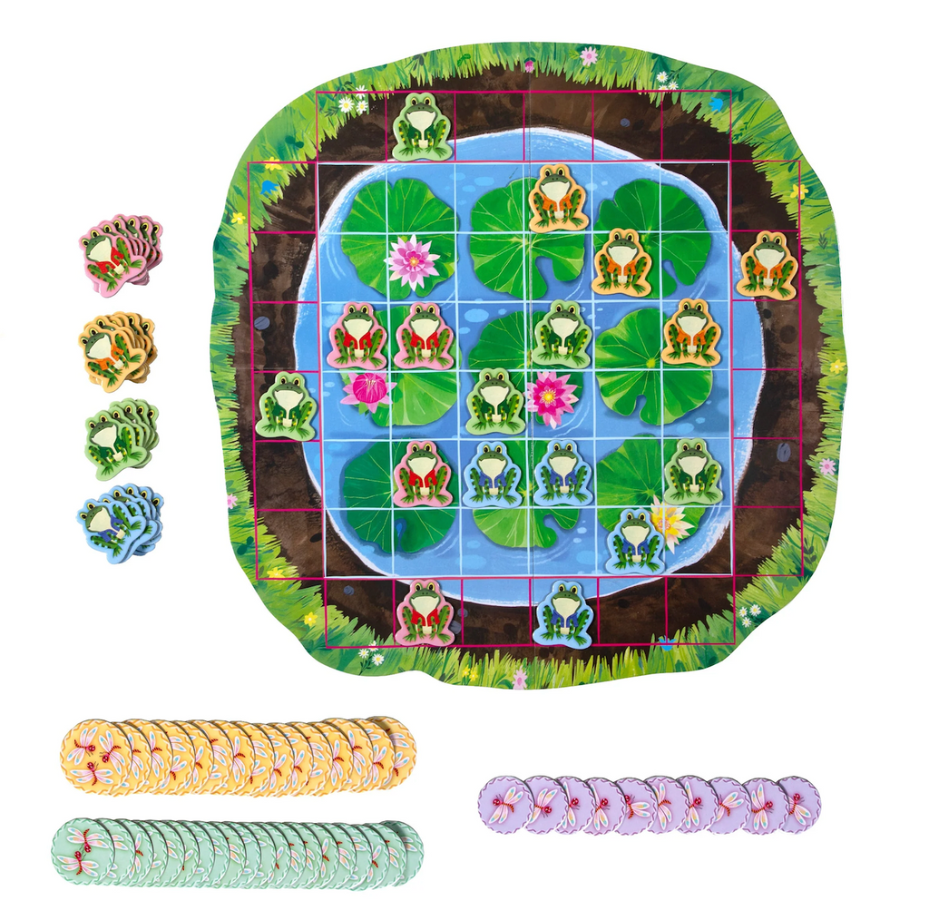 Board game set with frogs and lily pads on a pond-themed board with different colored frog and dragonfly tokens along the side of the board. 