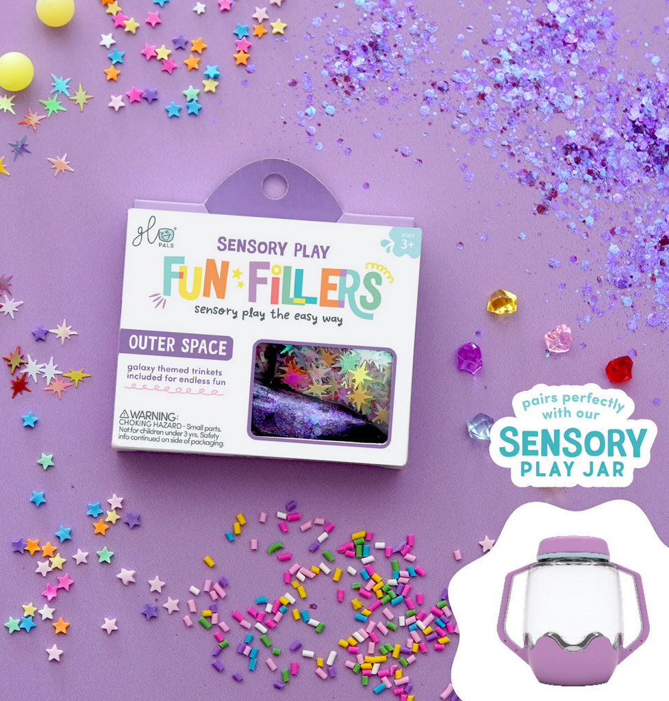 Fun Fillers galaxy themed trinkets spread out on a purple background. 