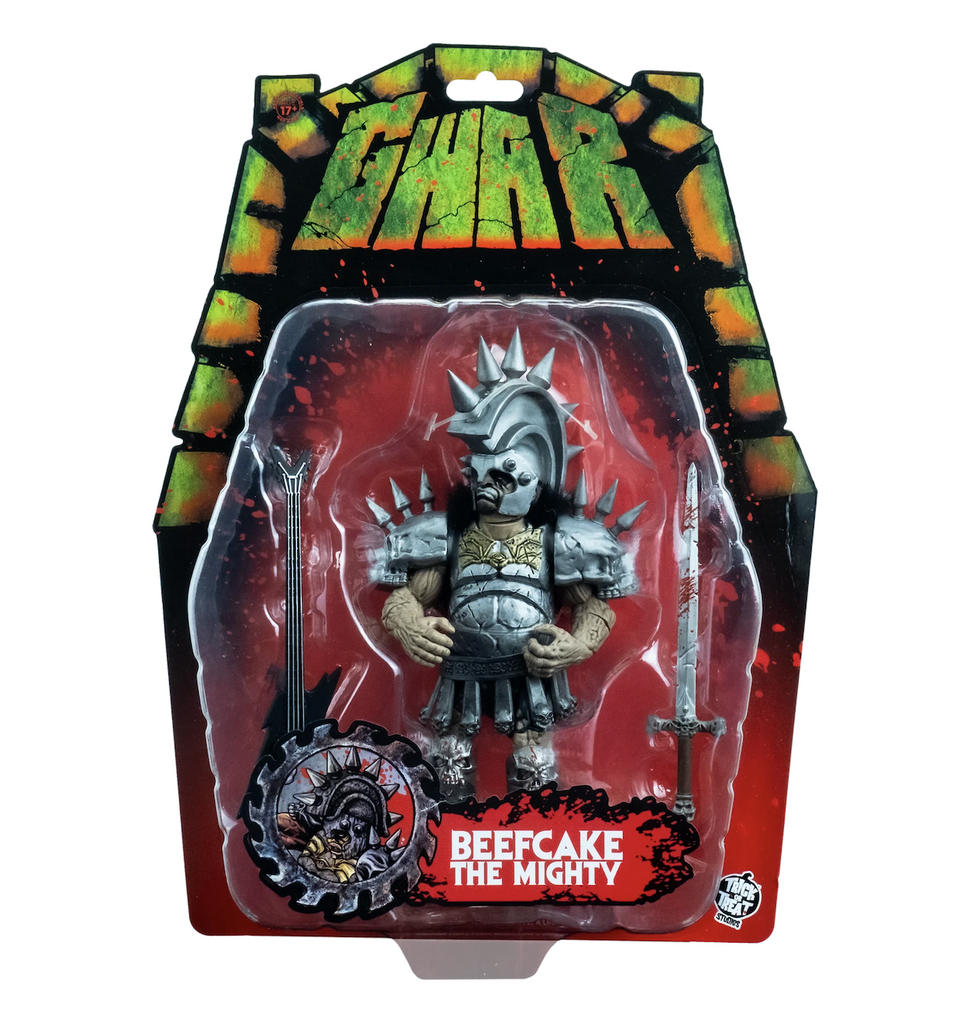Beefcake the Mighty action figure packaged in clear plastic on a backing card with red and green graphics. 