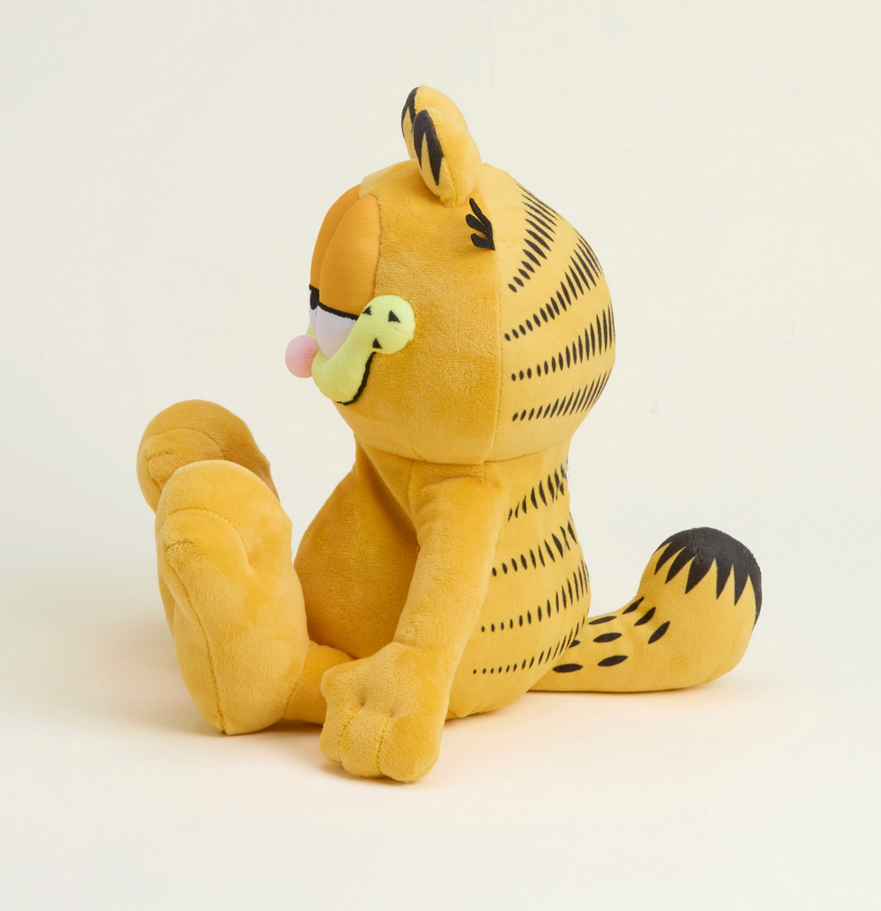 Garfield Warmies stuffed animal viewed from the side. 