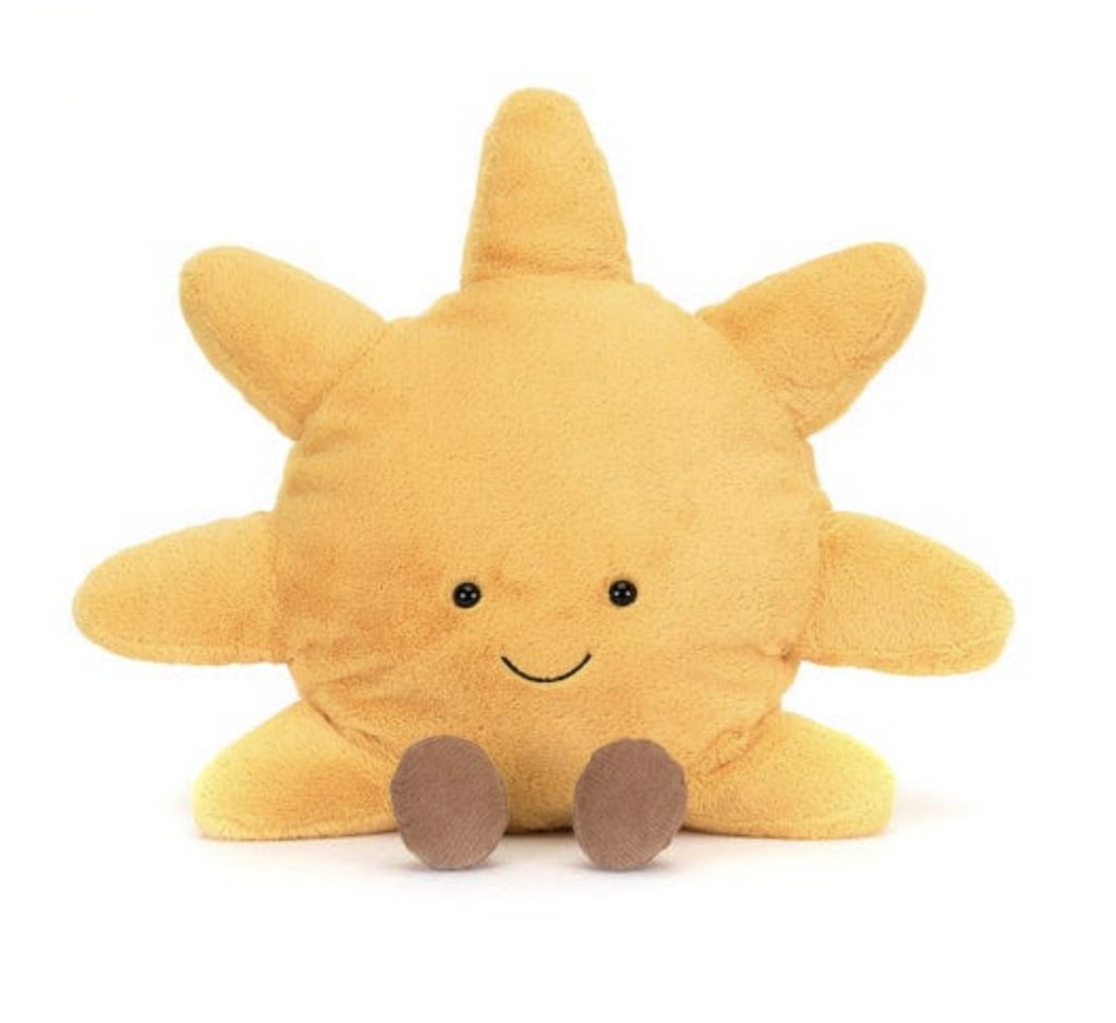 Gigantic stuffed Sun with a signature Jellycat smiling face and brown booties. 