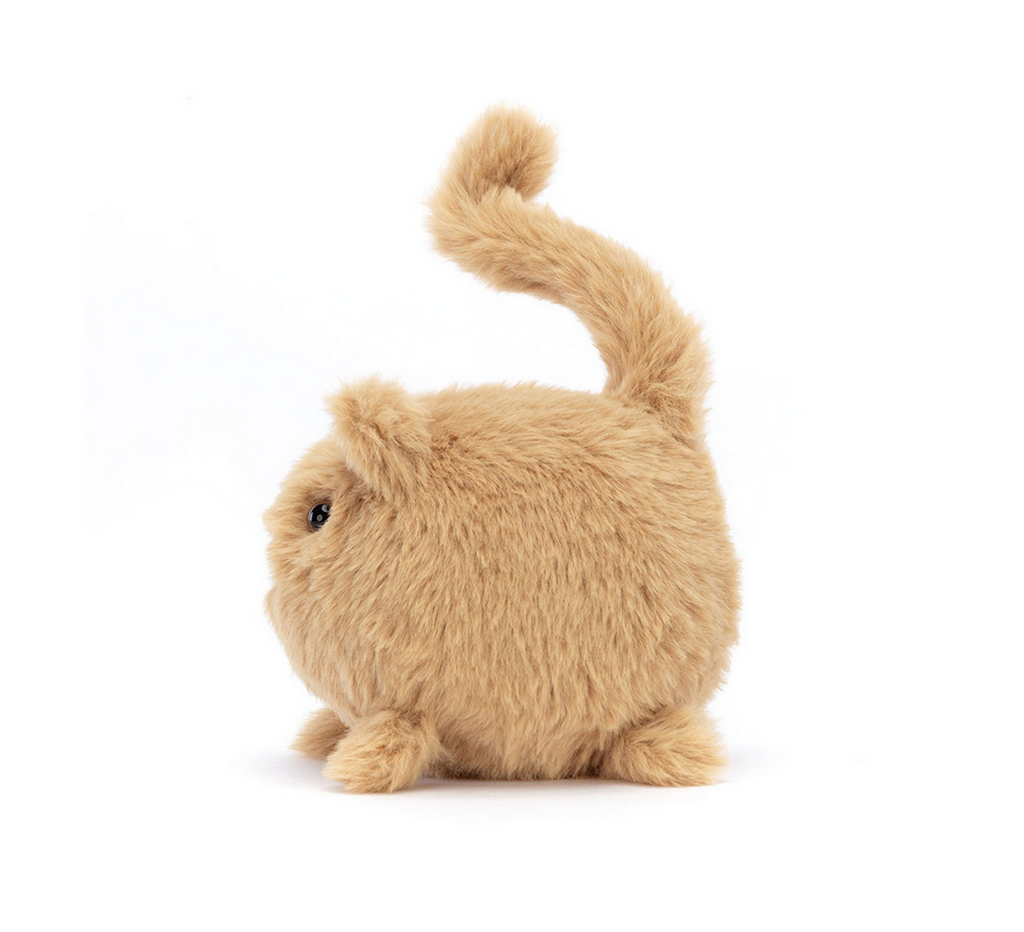 Side view of the Ginger Kitten Caboodle plush. 