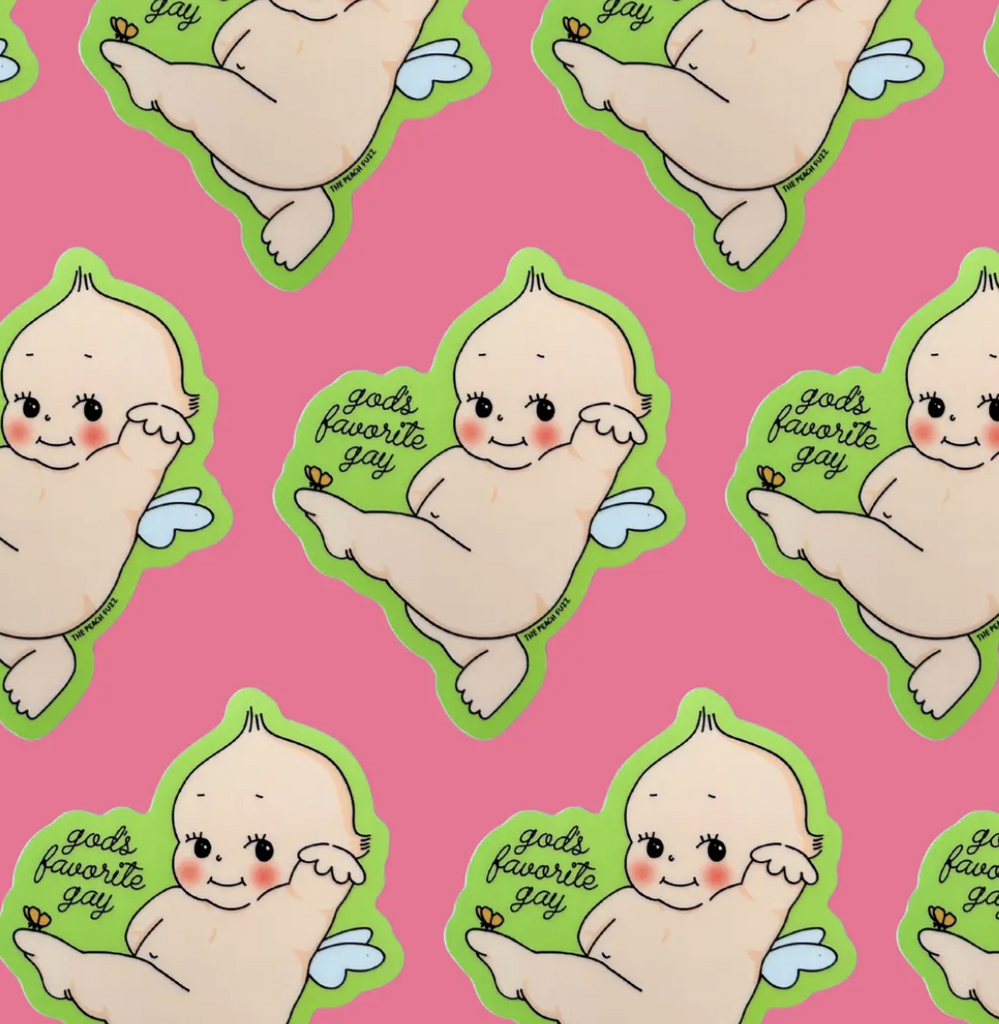 Kewpie doll sticker with green outline that reads "god's favorite gay" on pink background. 