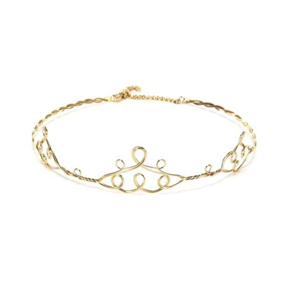 Gold filigree crown, with adjustable clasp. 