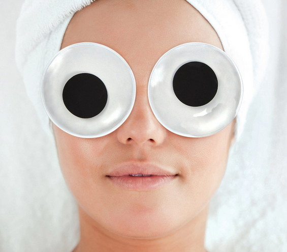 Googly eye gel eye pads on a person. 