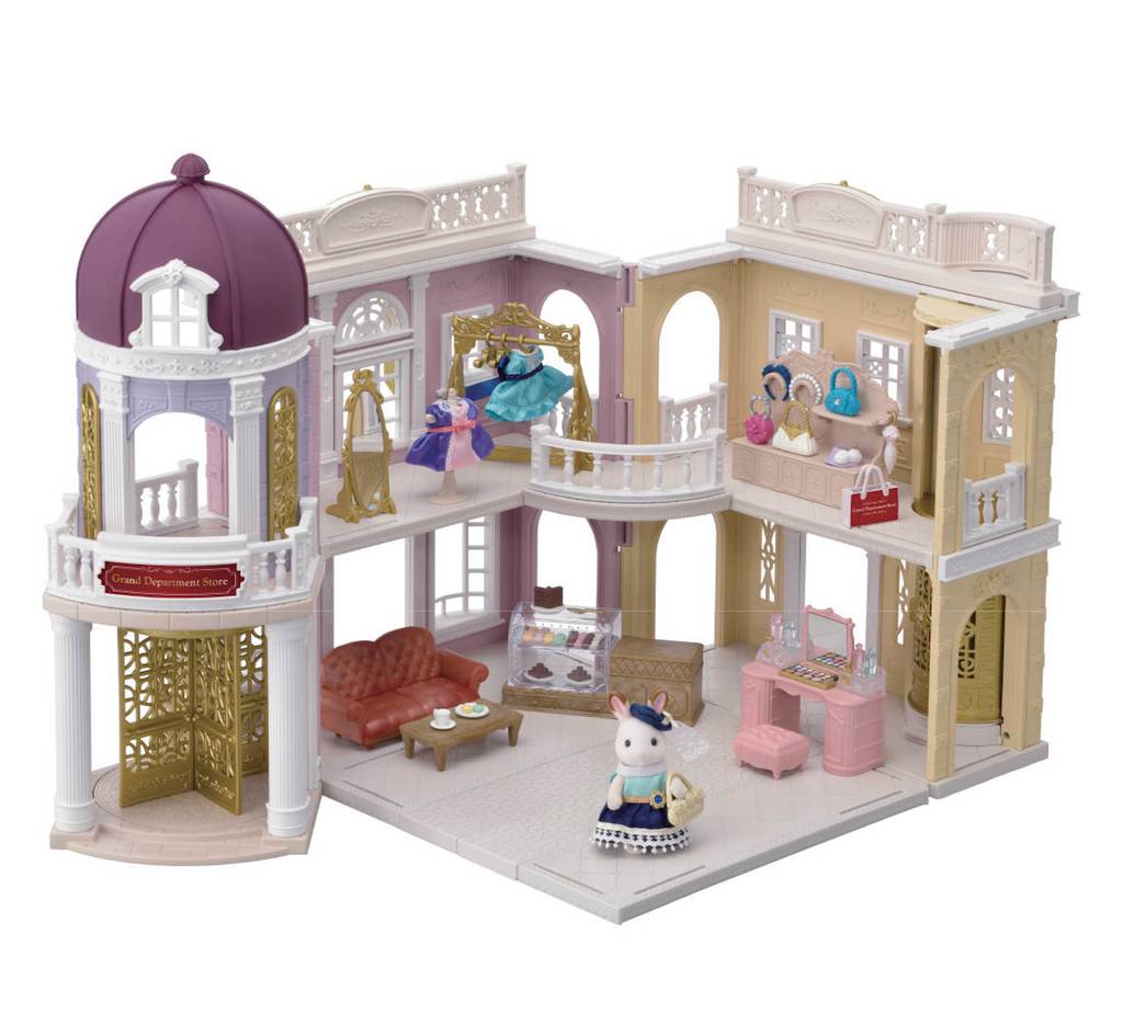 The Grand Department Store Gift Set is an embellished and innately detailed dollhouse featuring two levels and four spacious rooms, grand entrance tower with working revolving door and manual elevator.