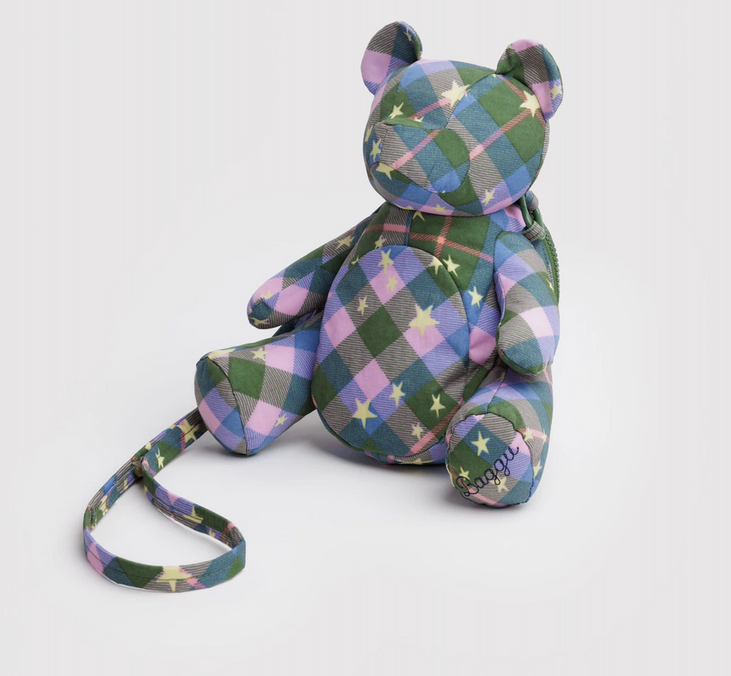 Bear shaped cross body bag with a green, pink and purple pattern with gold stars. 