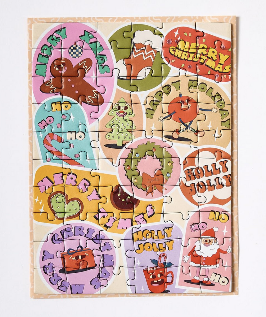 A jigsaw puzzle that is also a greeting card! Illustrated with festive little vignette drawings. 
