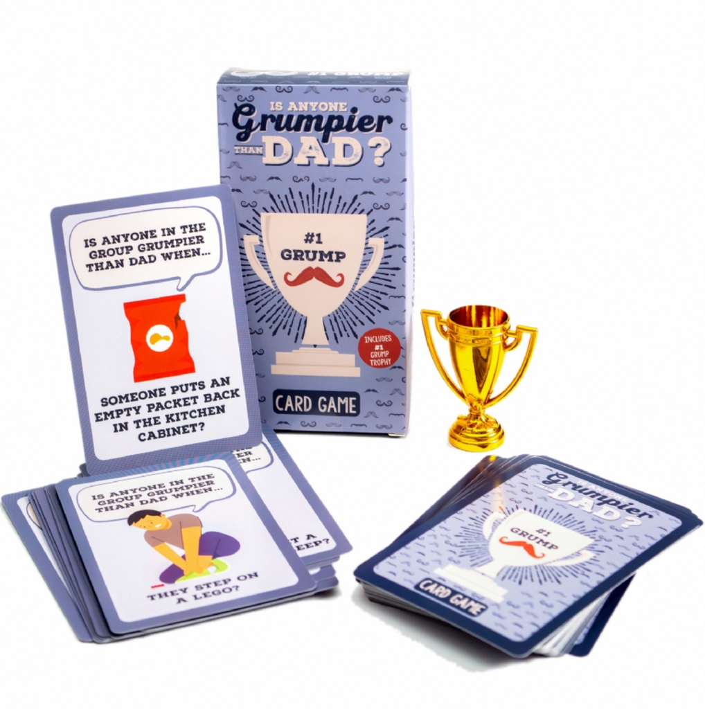 Game cards from "Is Anyone Grumpier Than Dad" stacked and ready to play with a small plastic trophy.