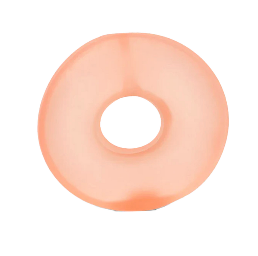 Translucent gel filled stress toy shaped like a flat disc with a hole in the center. 