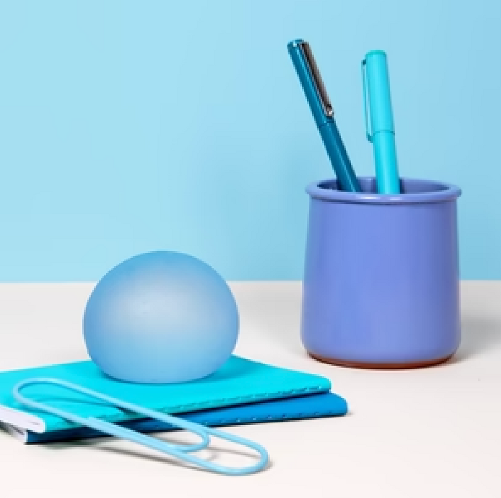 Gump stress ball in Dew a light blue color. 