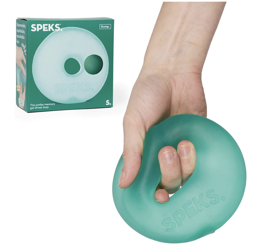 Speks Jumbo Loop stress loop in the color Sea Glass pictured in it's box that has an image of the stress loop on the front cover and a close up of a hand holding the jumbo Loop. 