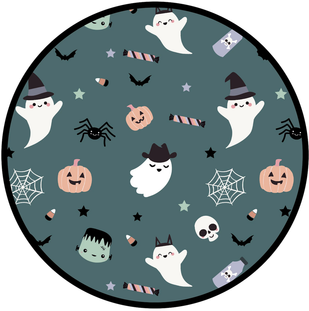 Close up of the Halloween pattern that glows in the dark on the Halloween Ghost Baby Lovey. 