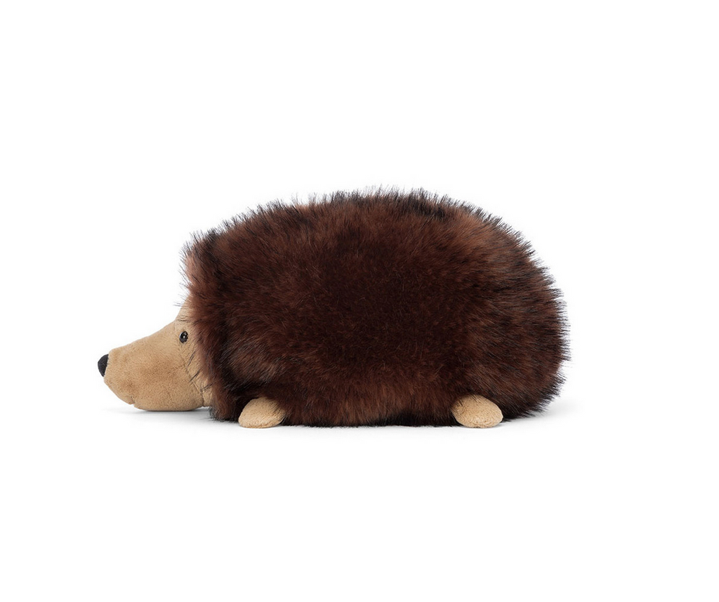 Side view of Hamish Hedgehog plush.