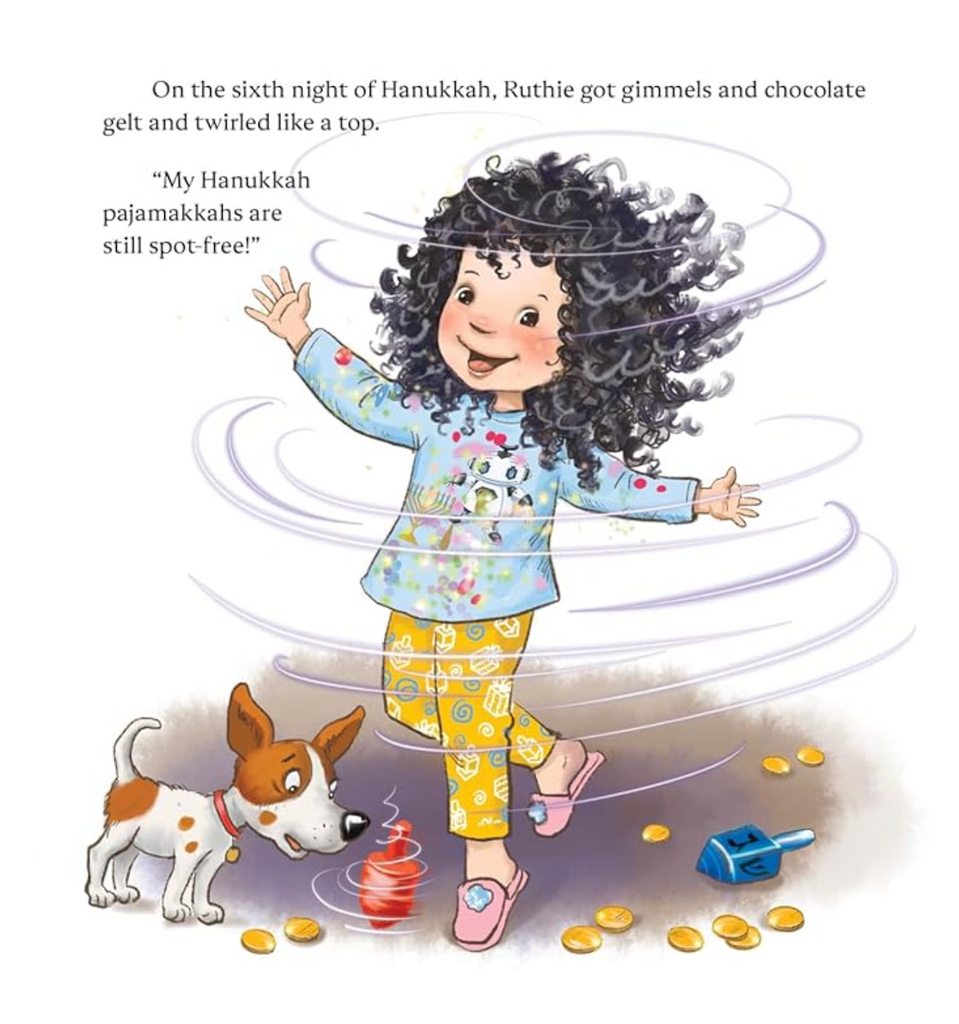 Interior page from Hanukkah Pajamakkahs with Ruthie the main character twirling around like the dreidel that was just spun amidst chocolate gelt on the floor. 