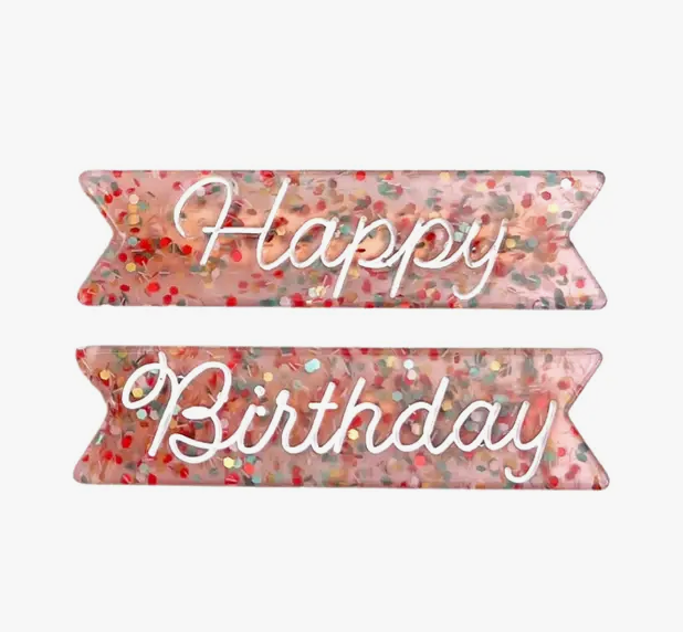 Happy Birthday hair clips come with two custom ribbon-edge, alligator clips. Clips are made of funfetti glitter cellulose acetate with white cursive ink inlay.