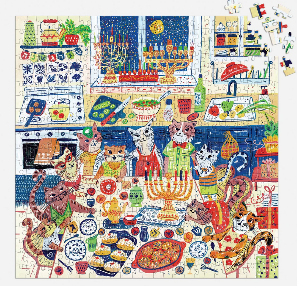Jigsaw puzzle with colorful illustration of cats around a Hanukkah menorah, traditional treats and toys of the season. 