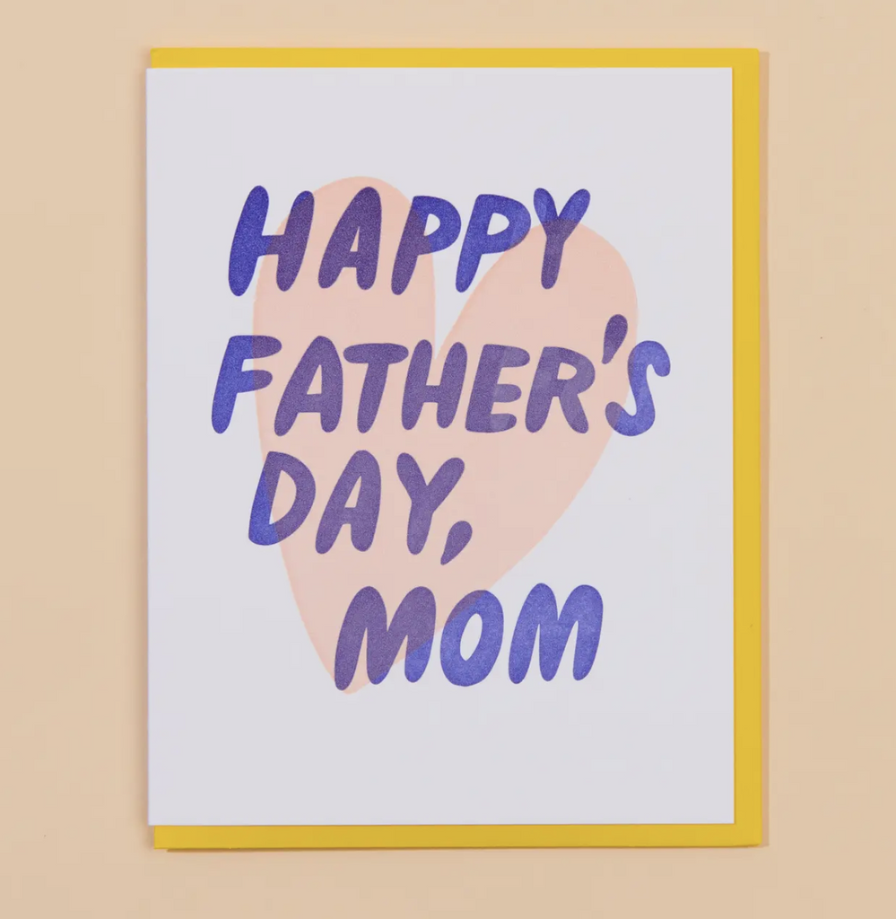 Greeting card that reads "Happy Father's Day, Mom" in purple, block lettering.