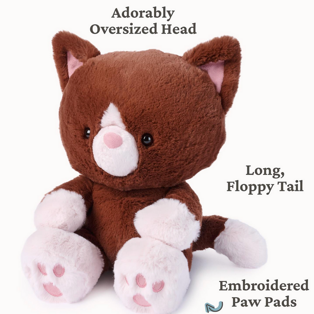 Brown plush kitty with oversized head and embroidered paw pads and text that points out features of Hazel the Cat. 
