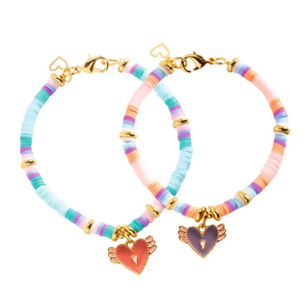 Two bracelets with colorful beads and heart charms made from the Heart Heishi  Beads and Jewelry kit. 
