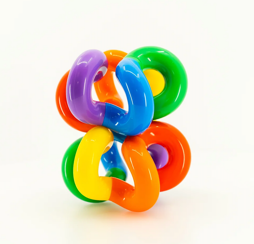 An abstract stack of colorful shapes from the Helius Puzzle. 