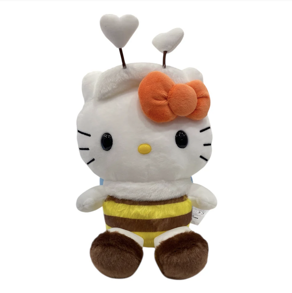 Plush Hello Kitty love bug dressed as bumble bee wearing a yellow and brown striped outfit with fuzzy brown booties and heart shaped antennae. 