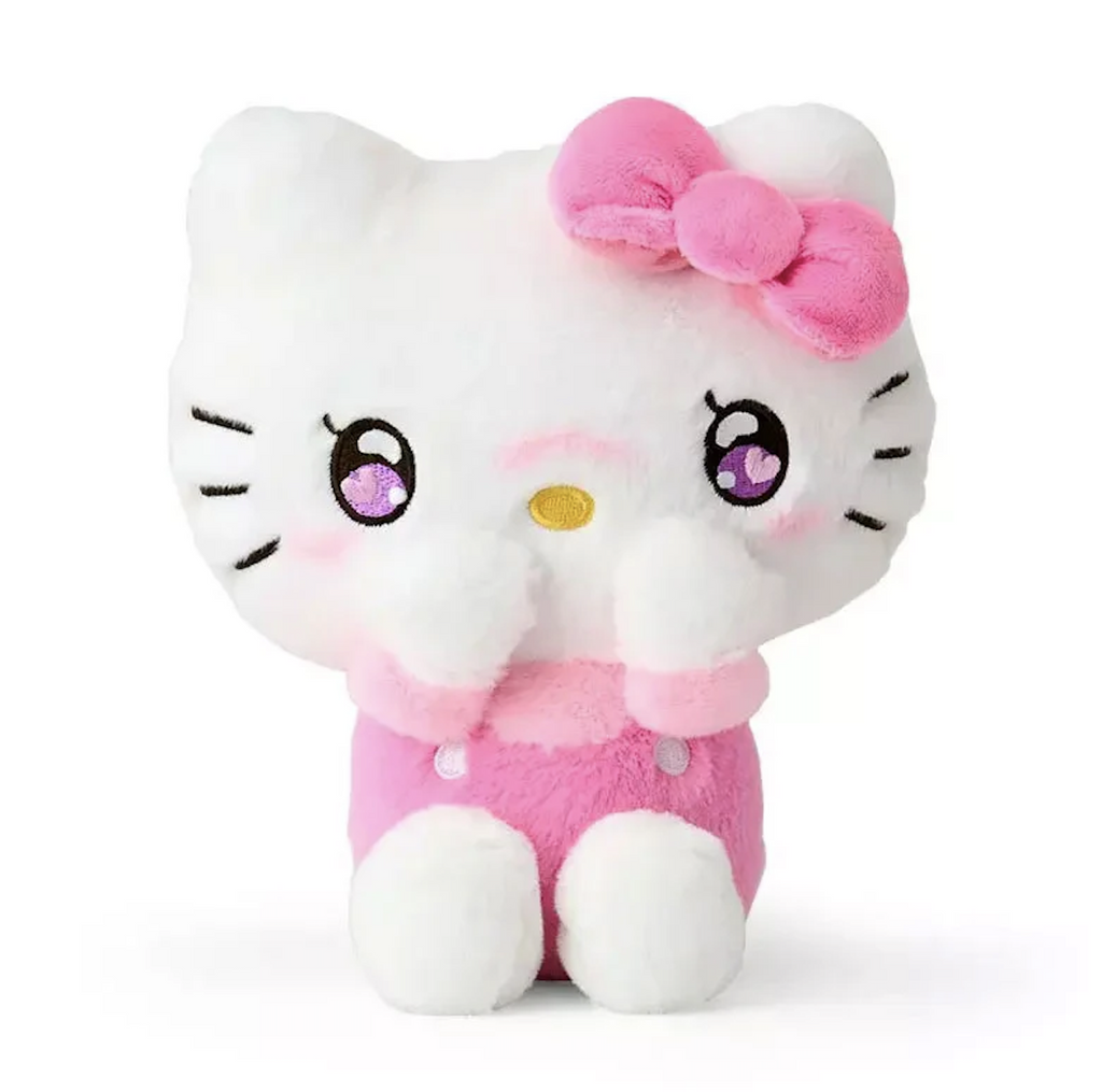 Hello Kitty Excited Emotions stuffed animal wearing pink overalls, light pink t-shirt and pink bow.
