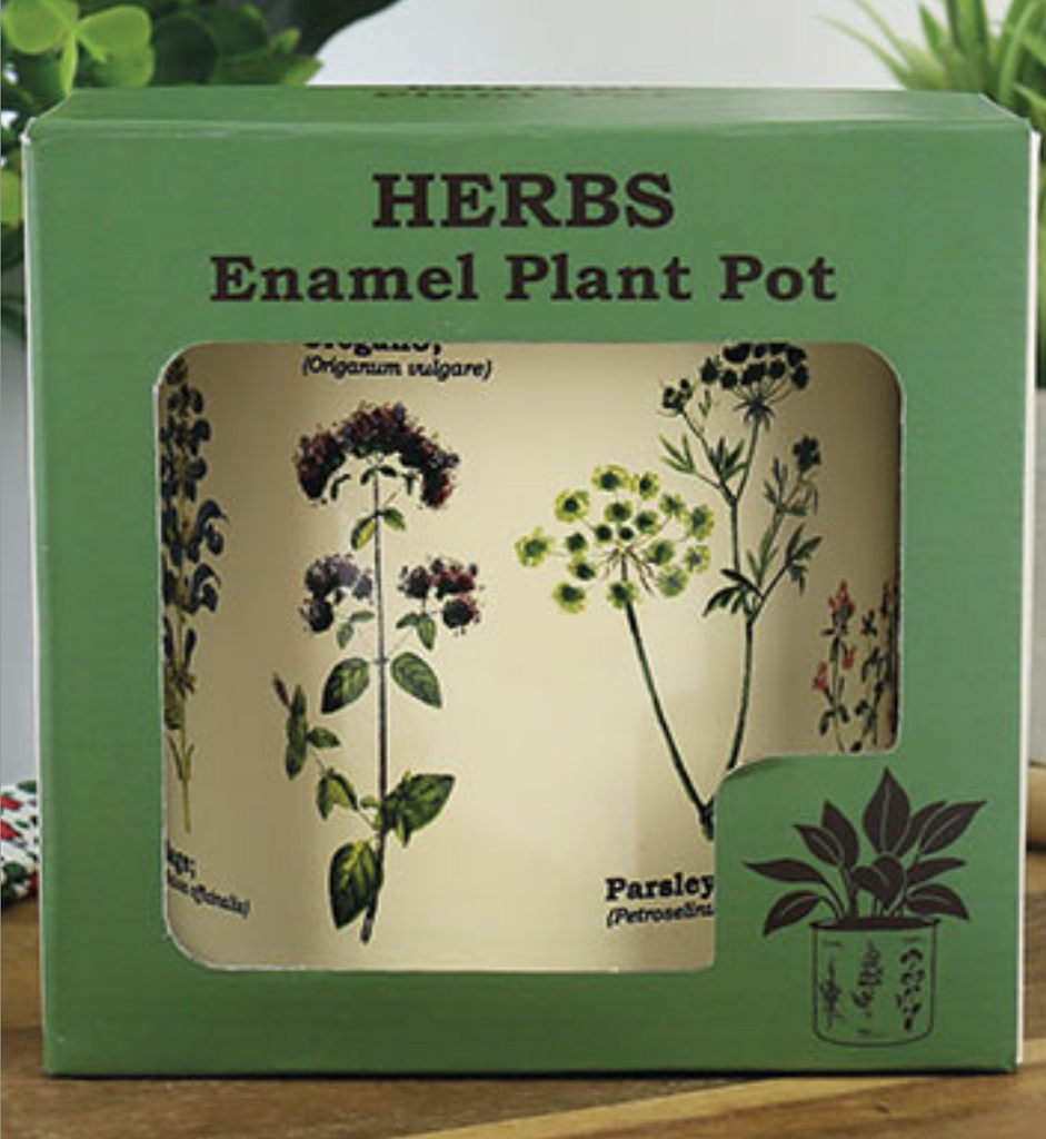 Herbs Enamel Plant Pot packaged in a green box with open sides to show off the illustrations on the planter. 