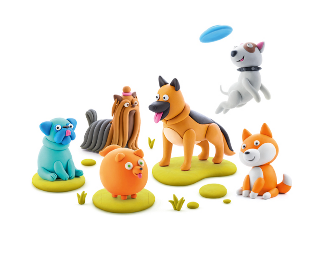Several colorful dog figures of all breeds made using the clay and sculpting tools in the Hey Clay Dog Story kit. 