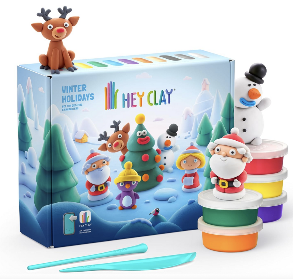 Hey Clay Winter Holidays craft set with cans of red, orange, green, yellow,and purple dough, Santa, Snowman, and reindeer figures placed around the box that has a picture of all the figures in a winter scene. 