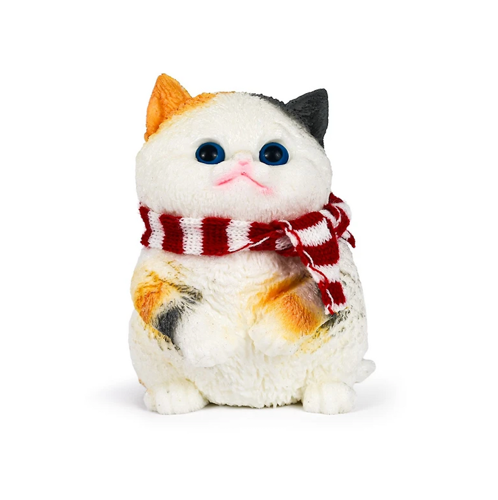 Mega Squishy Kitty with calico colored fur wearing a red and white striped scarf. 