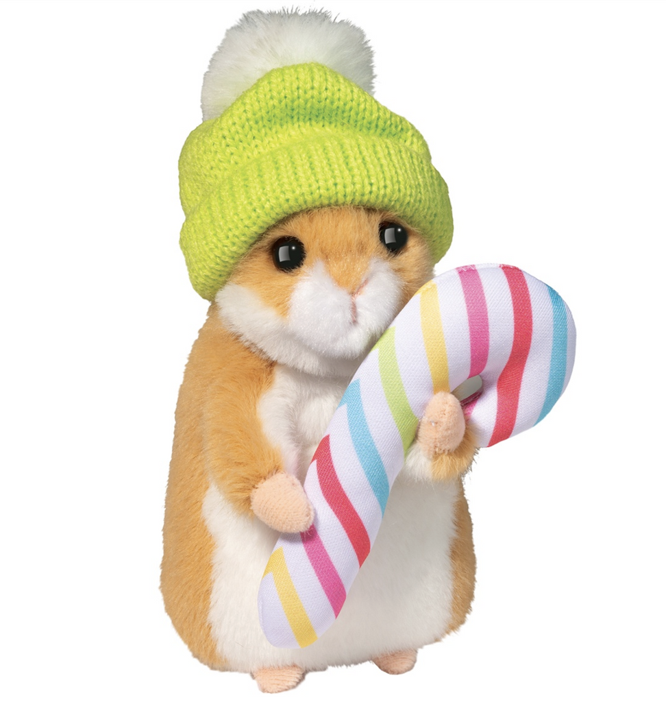 The sweetest Holiday Hamster with Winter Hat and Candy Cane stuffed animal. The cute plush hamster is standing upright wearing a green beanie with white pom pom and holding a multicolored candy cane. 