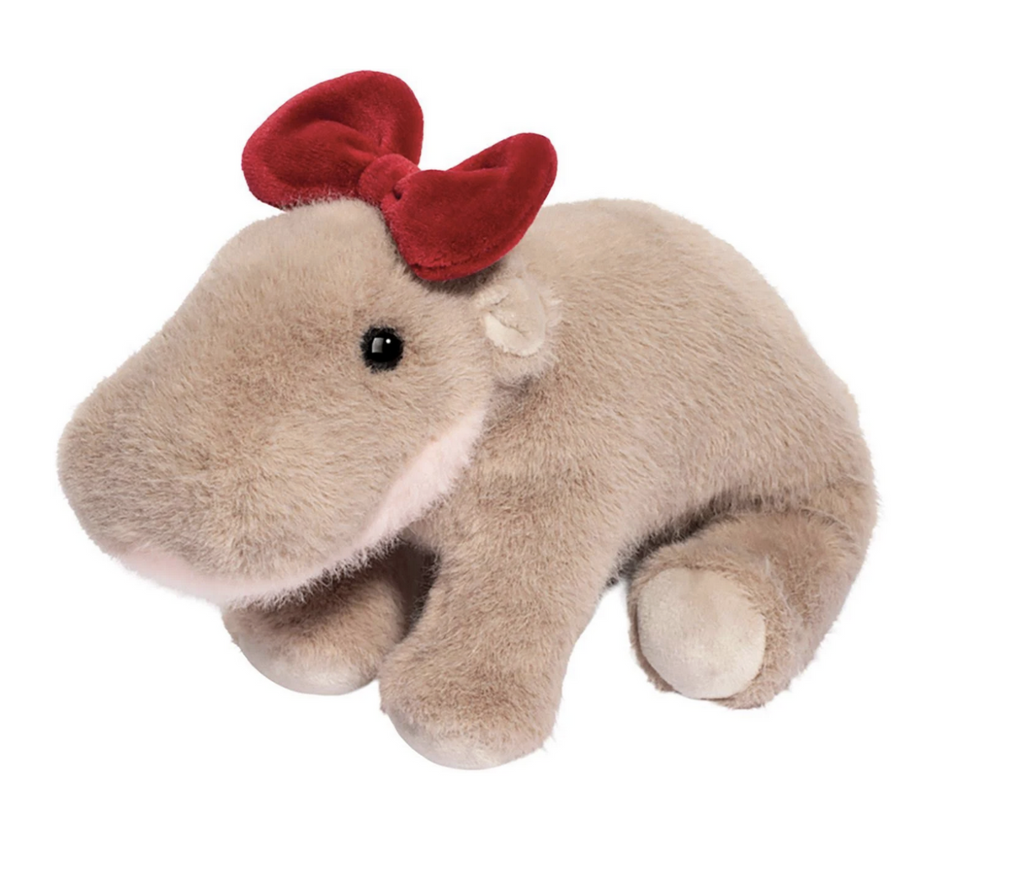 Cute little plush pygmy hippo with a festive red bow on her head. 