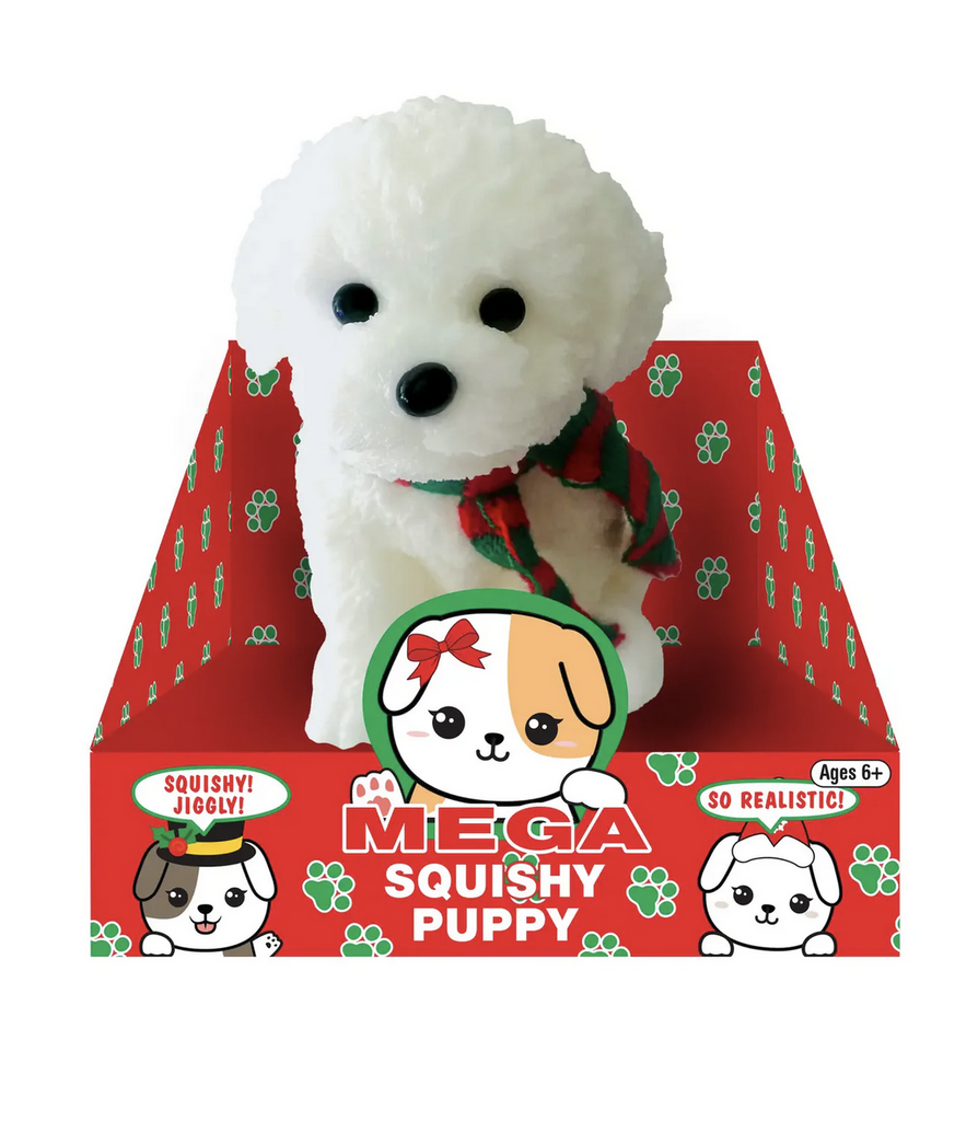 Adorable Mega Squishy Puppy with white fur wearing a green and red plaid scarf sitting in a holiday themed box. 