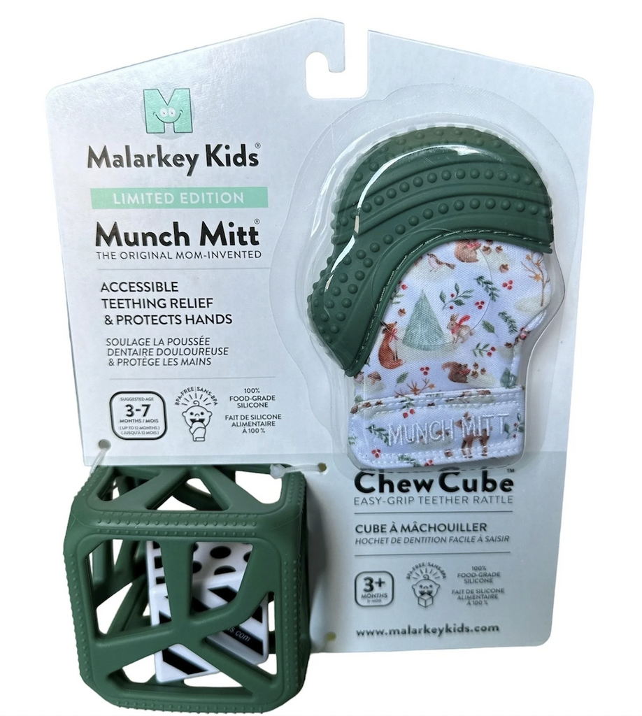 Holiday Munch Mitt and Chew Cube packaged in clear plastic to show off the limited edition holiday print on the munch mitt. 