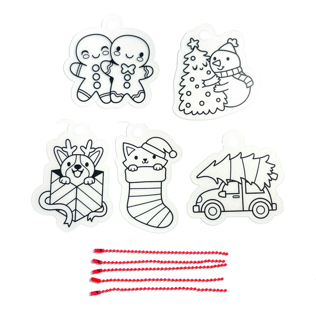 A tree-loving snowman, stocking-stuffer kitten, reindeer pup, cheerful gingerbread duo, and a tree toting car, and red ball chains that come inside the Holly Jolly Shrink It's kit. 