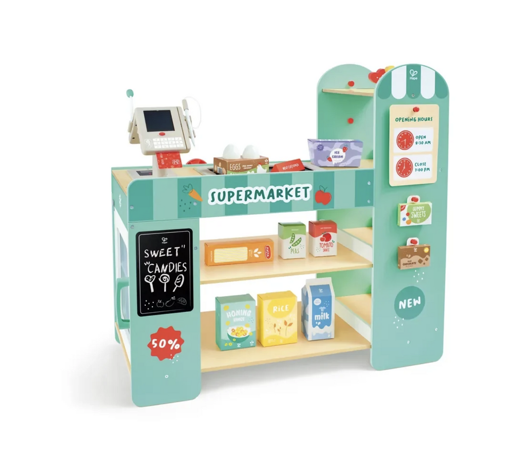 A wooden playset featuring a hand-cranked conveyor belt, a smart scanner that actually displays prices, and an interactive cash register with a card swipe, there are supermarket shelves to be stocked and even a chalkboard sign that can be customized. 