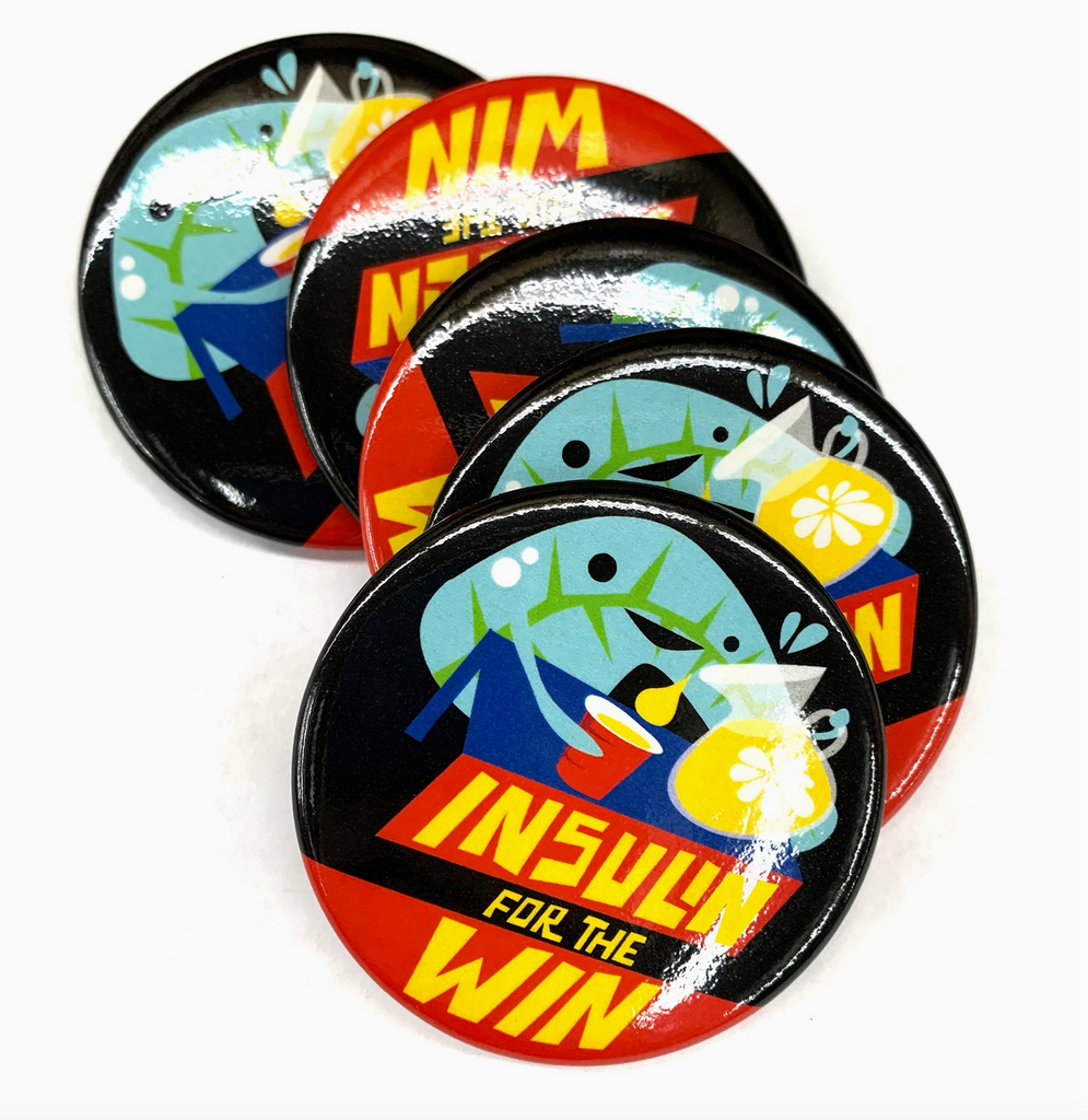Several "Insulin for the Win" round magnets. 