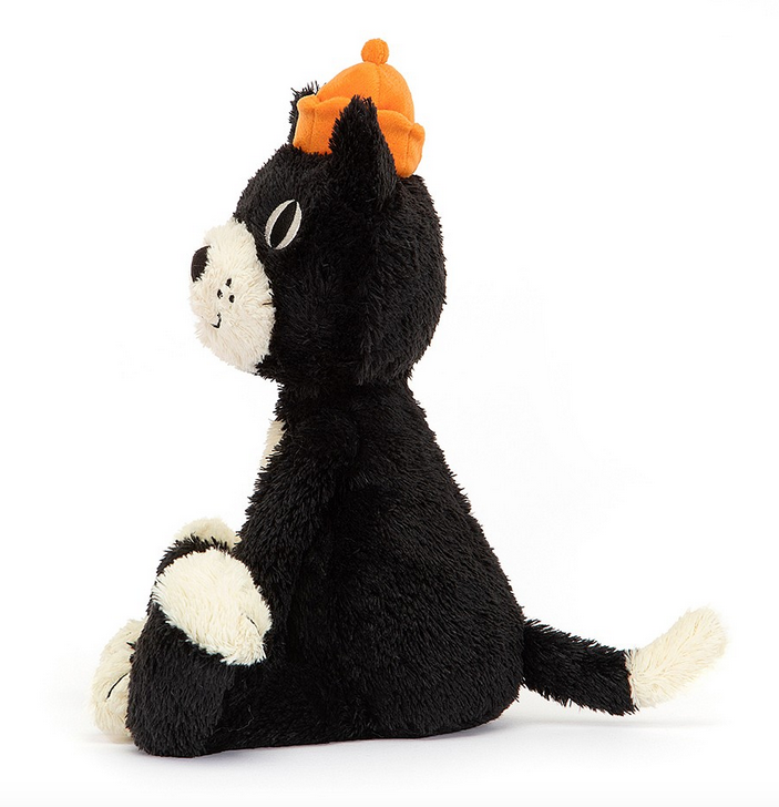 Huge Jellycat Jack plush viewed from the side, his white tipped tail and toes are visible. 