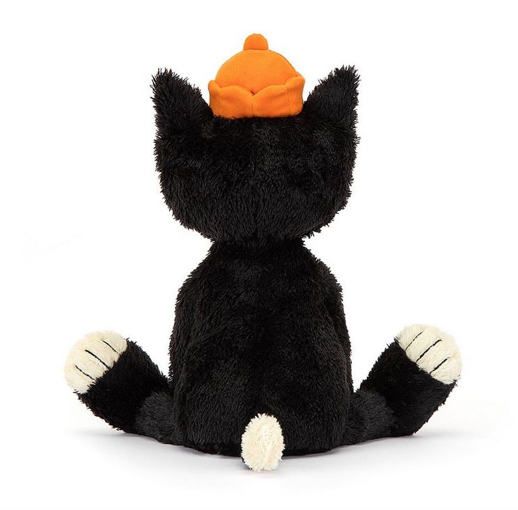 View of the back of Jellycat Jack. His back is all black with a white tipped tail and toes.