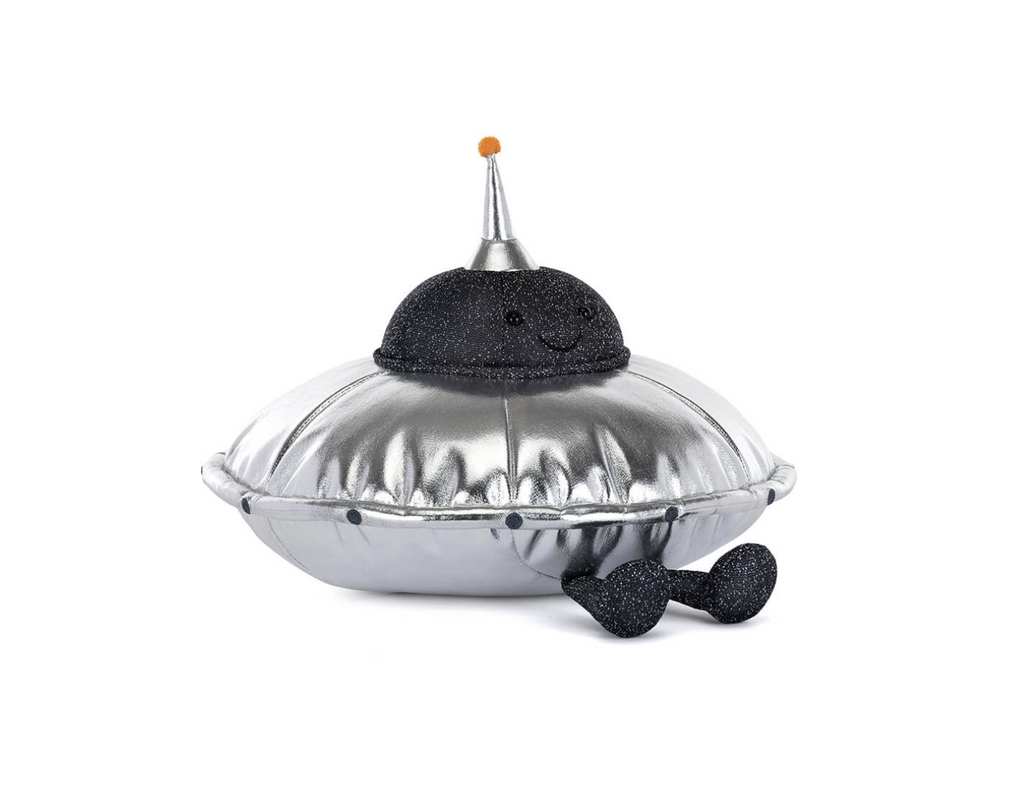 Sparkly black and shiny silver plush space saucer with a smiling face sitting on a white background.