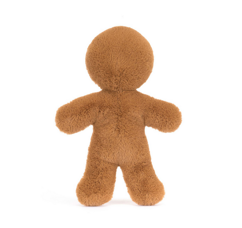 Rear view of brown gingerbread man plush on a white background.