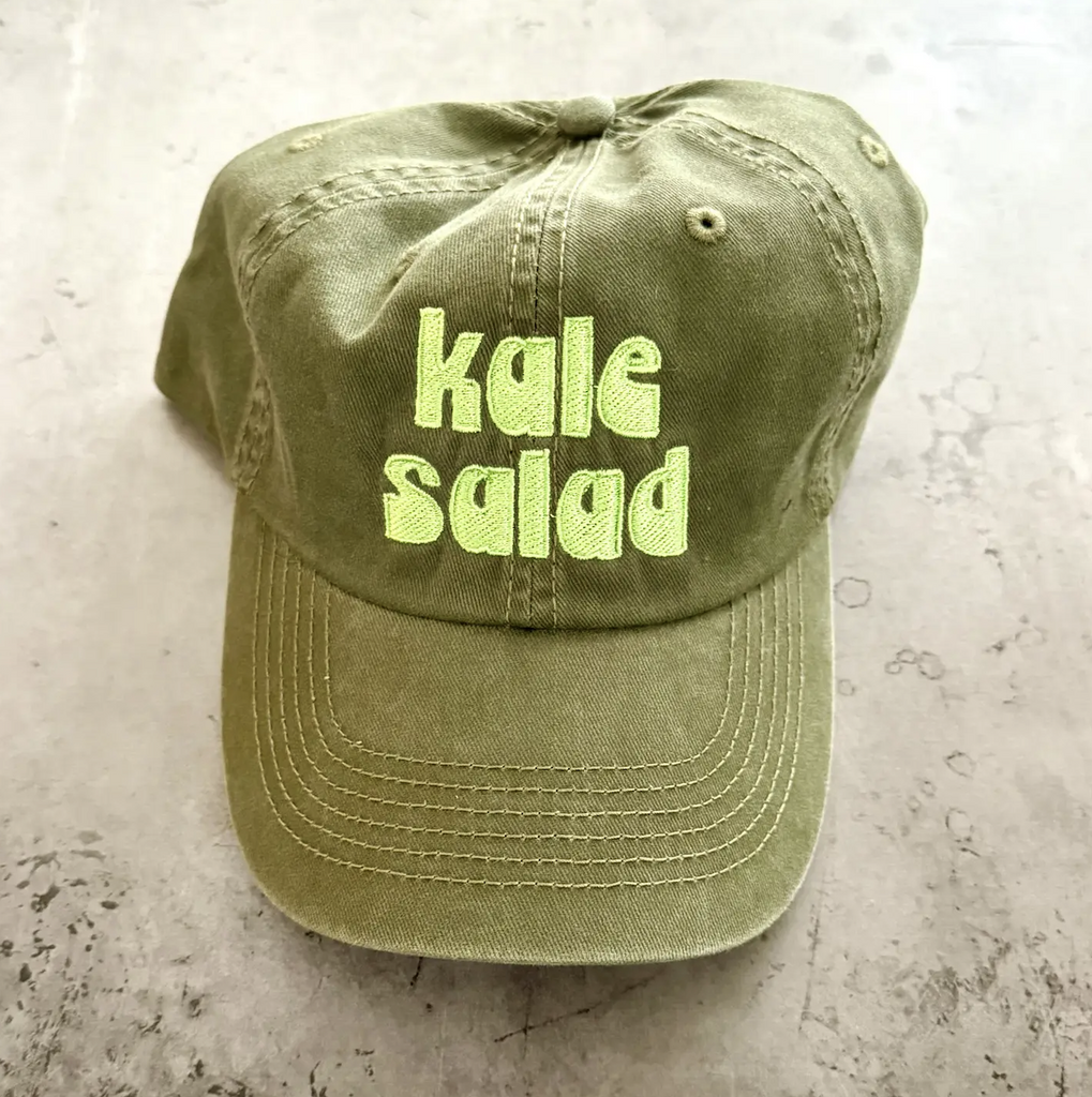 Green ball cap with "Kale Salad" embroidered on the front in bright green. 