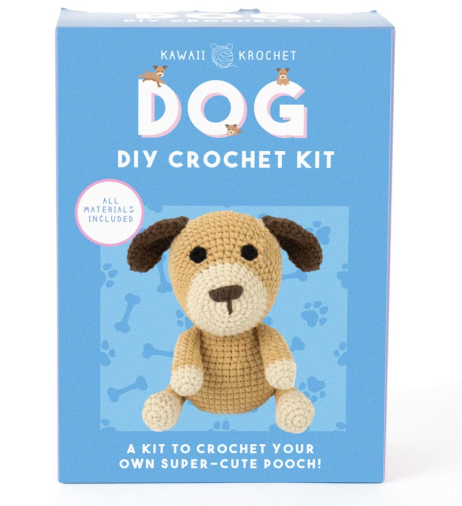 Blue box with a picture of the crochet dog that can be made using the kit. 