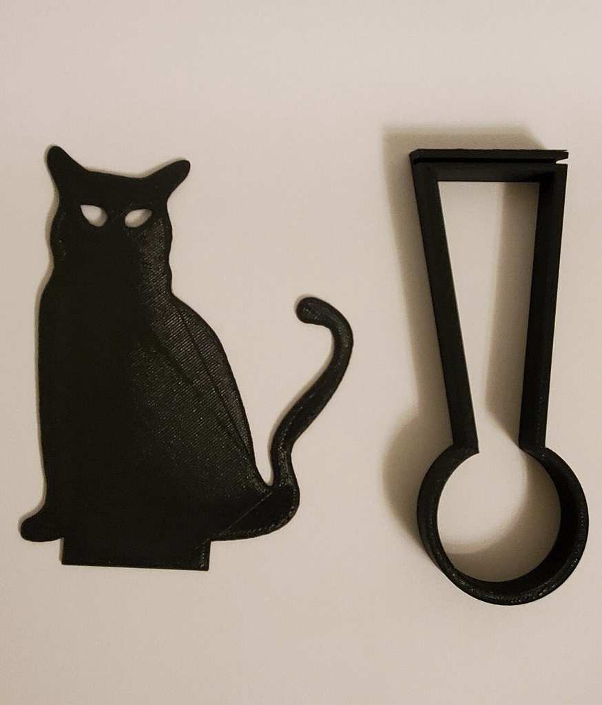 Kealite Black Cat Shadow Caster and the tea light candle holder. 