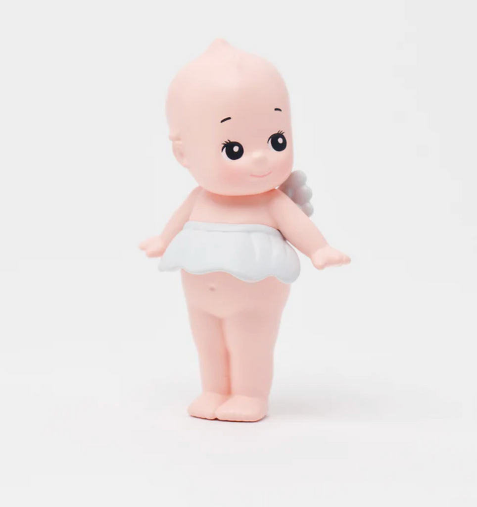 Standing Kewpie doll figure.