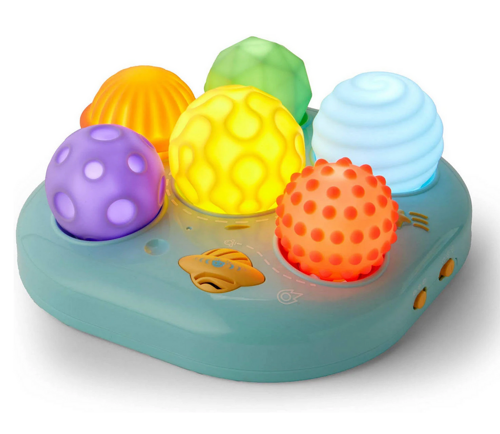 The Kidoozie Sensory Ball Night Light with  various colorful, textured balls lit up. 