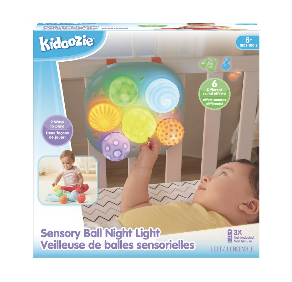 The Kidoozie Sensory Ball Night Light packaged in a  box with a picture of a baby lying in a crib while some of the balls are illuminated. 