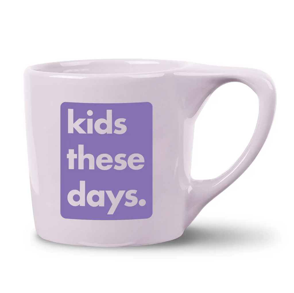 Very light purple mug with a caption that reads "kids these day" in a darker purple square. 